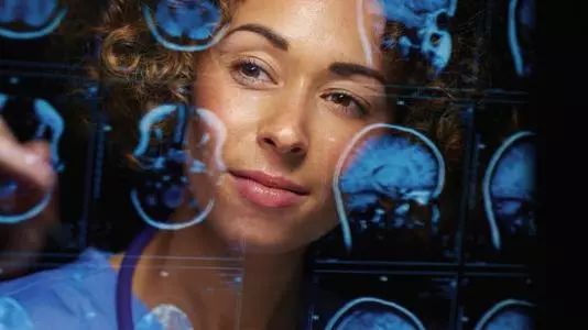 woman looking at medical imaging