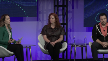 three colleagues on a panel discussion