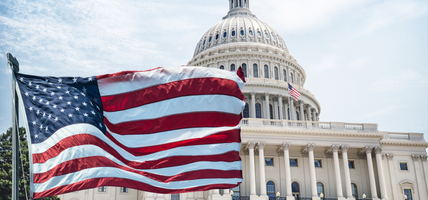 American flag waving for a national holiday in washington dc