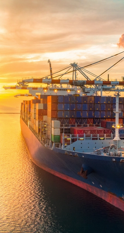crane loading cargo container to container ship 