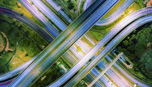 Aerial top view, Highway road, bridge over main road at night 