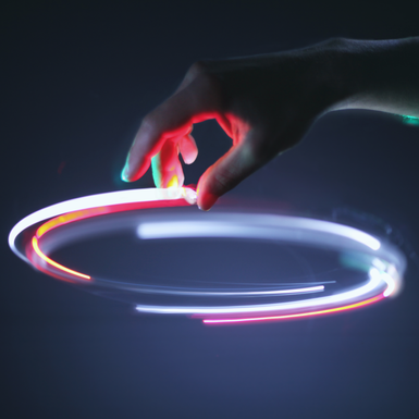 hand swirling colored lights