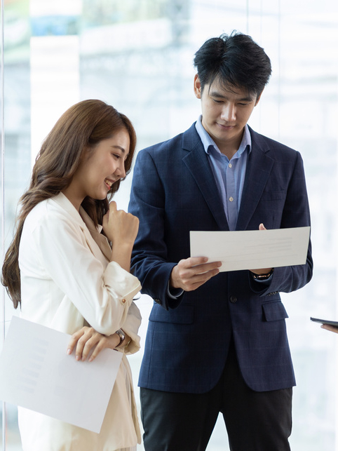 Collaboration of people in the organization. Colleague or business partner discussing plans to work on a project together.