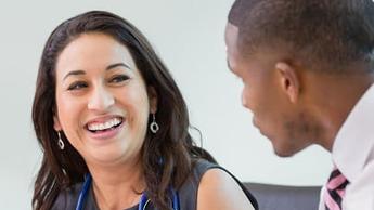 smiling female doctor with executive