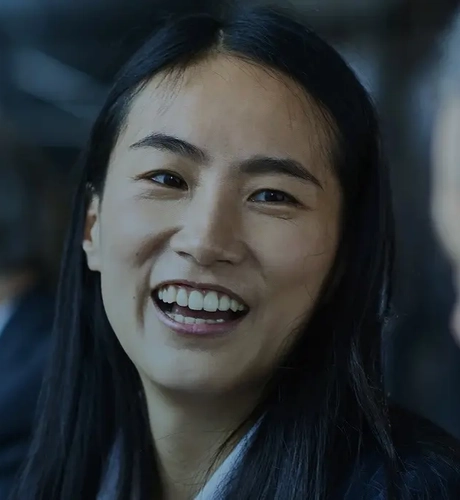woman happily smiling at colleague