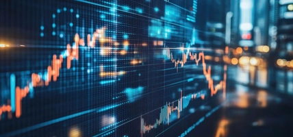 Stock market data displayed on a screen with a blurred city backdrop at night.