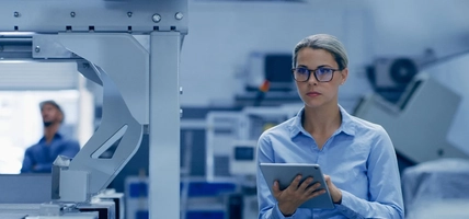 Woman, engineer and tablet for machine learning or monitoring ai precision, automation or productivity at factory