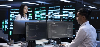 two colleagues working in a data center